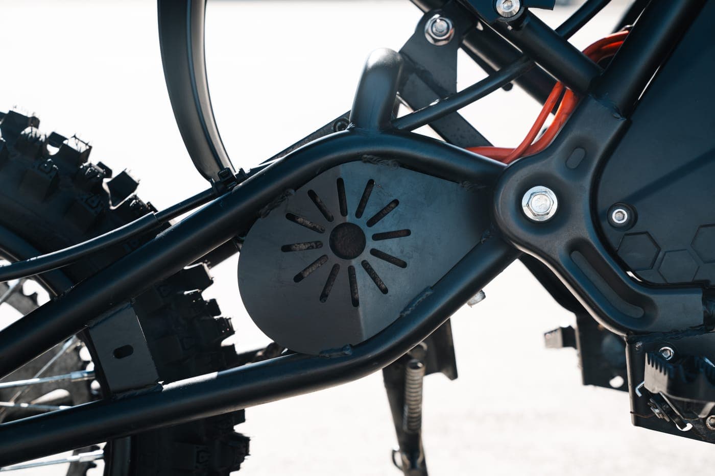 Motor cover with the Revex sunburst mark